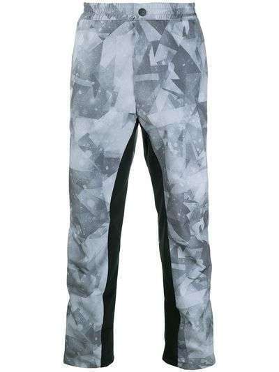 White Mountaineering брюки с геометричным принтом из коллаборации с Colmar AGE