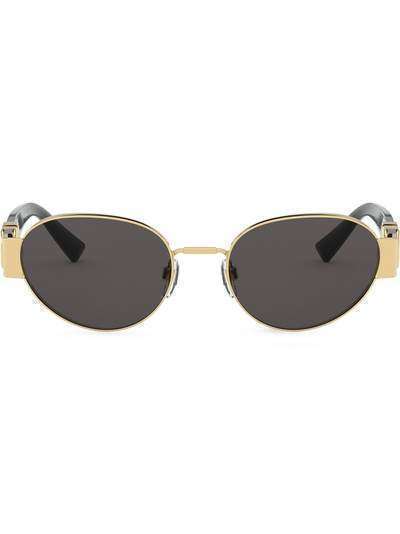 Valentino Eyewear солнцезащитные очки в овальной оправе с логотипом VLogo