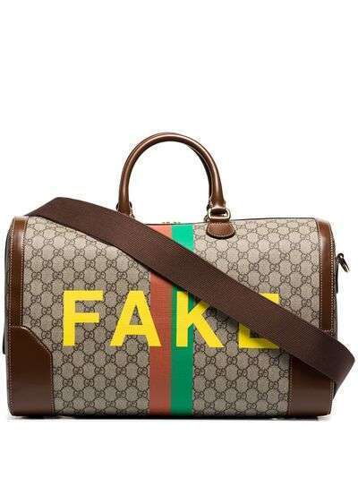 Gucci дорожная сумка с принтом Fake/Not