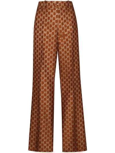 Gucci расклешенные жаккардовые брюки с узором GG