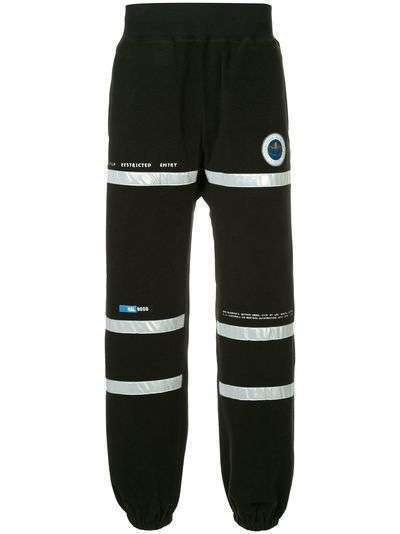Undercover спортивные брюки с заплаткой 'Astronautics Agency'