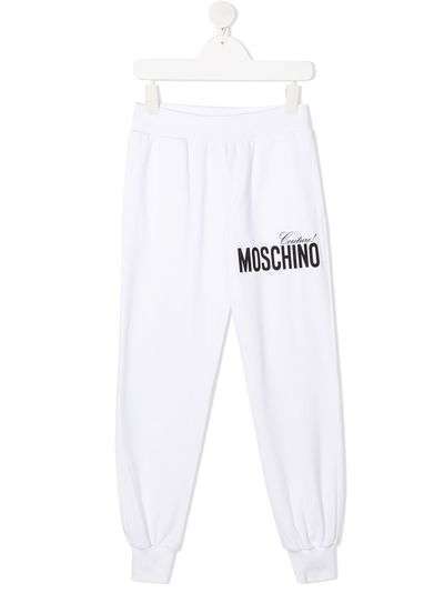 Moschino Kids спортивные брюки с логотипом Couture!