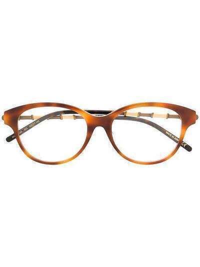 Gucci Eyewear очки в круглой оправе с двухцветными дужками GG0658OA003