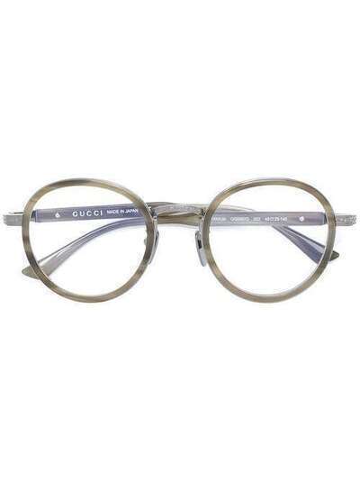 Gucci Eyewear очки в круглой оправе GG0067O