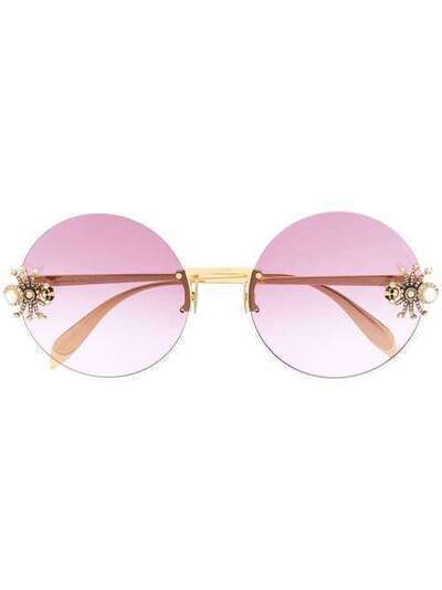 Alexander McQueen Eyewear солнцезащитные очки в круглой оправе AM0207S