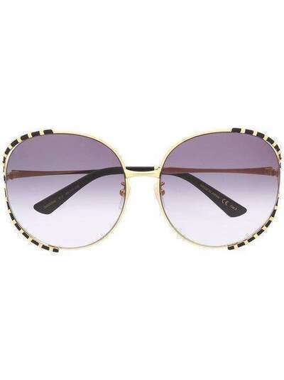 Gucci Eyewear солнцезащитные очки в массивной круглой оправе GG0595S012