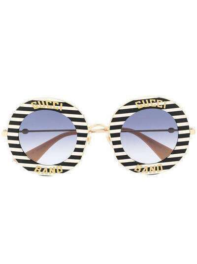 Gucci Eyewear солнцезащитные очки в круглой оправе в полоску GG0113S008