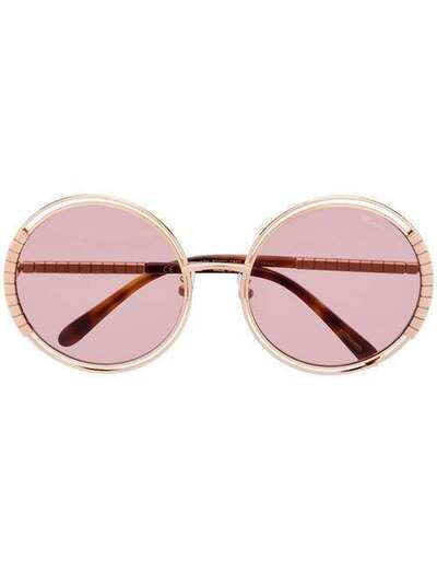 Chopard Eyewear солнцезащитные очки в круглой оправе SCHC7908FC