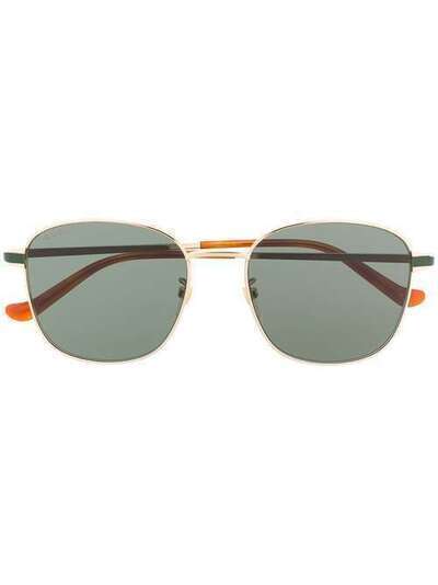 Gucci Eyewear солнцезащитные очки в круглой оправе GG0575SK004