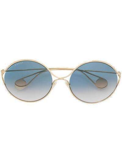 Gucci Eyewear массивные солнцезащитные очки в круглой оправе GG0253S