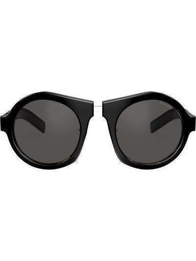 Prada Eyewear солнцезащитные очки в массивной круглой оправе PR10XS1AB5S0