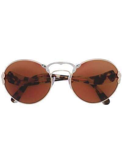 Prada Eyewear солнцезащитные очки в круглой оправе SPR55T