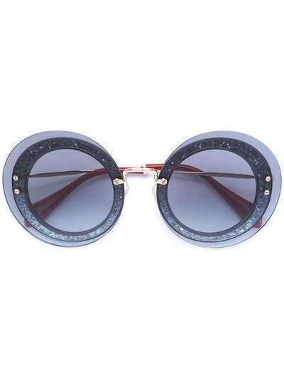 Miu Miu Eyewear солнцезащитные очки 'Reveal' SMU10R