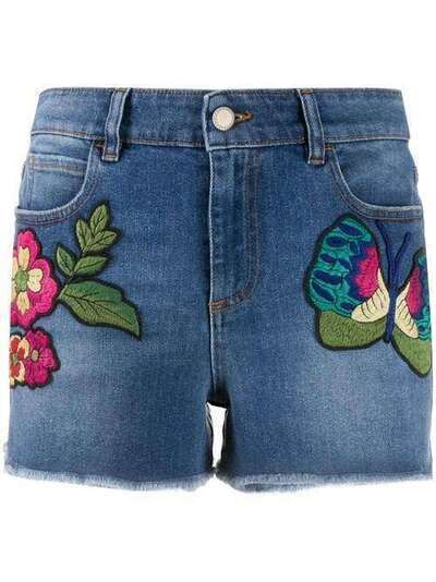 RedValentino джинсовые шорты с цветочной вышивкой TR0DD02F540