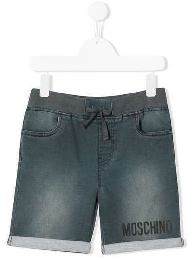 Moschino Kids джинсовые шорты с эффектом потертости HUQ000LDE06