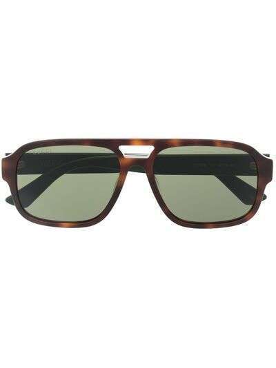 Gucci Eyewear солнцезащитные очки черепаховой расцветки с отделкой Web