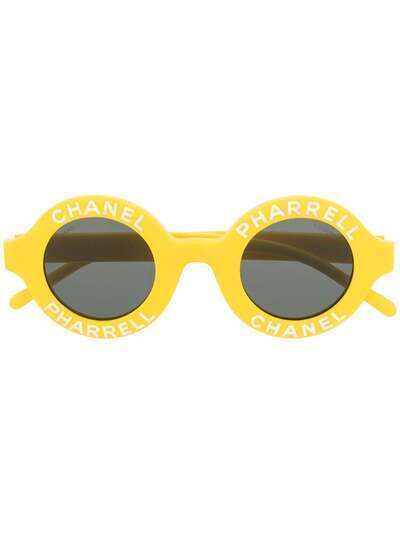 Chanel Pre-Owned солнцезащитные очки Pharell в круглой оправе с логотипом CC