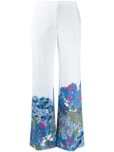 Valentino расклешенные брюки с принтом