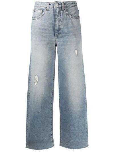 Totême джинсы широкого кроя с эффектом потертости